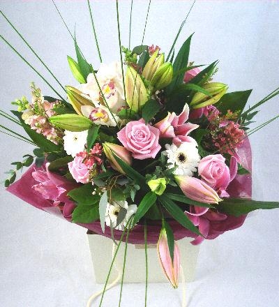 A luxury Hand tied bouquet with roses and lily