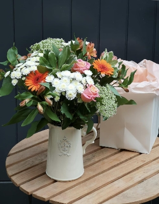 Ceramic jug of flowers