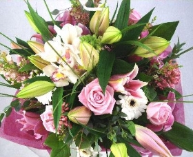 A luxury Hand tied bouquet with roses and lily