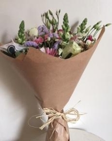 Luxury summer tied bunch in craft paper